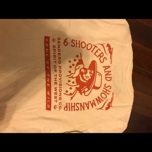 cream colored logo T